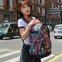 2021新款时尚双肩包女夏旅行背包防水大容量帆布男高初中学生书包 树叶红1089