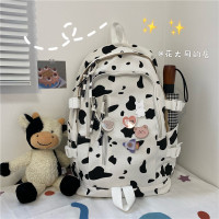 书包女ins风 韩版高中学生奶牛帆布背包潮百搭大容量初中生双肩包 白色奶牛纹 送徽章五件套