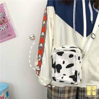 日系原宿风百搭少女可爱包包女韩国ins复古奶牛帆布包学生斜挎包 奶牛帆布包长形版(无任何挂件)