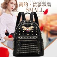 真皮质感斜挎包2021新款真皮双肩包女包软皮百搭韩版潮小背包 黑色711蜜蜂背包大容量