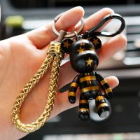 潮牌汽车钥匙扣韩国创意暴力熊公仔男女情侣钥匙链挂件女生包挂饰 金皮绳+美旗黑金