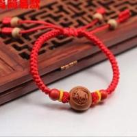 儿童手链 宝宝饰品 猪惊骨黑狗牙 野生桃核雕刻龙纹 桃篮筐12生肖 D款桃核生肖款 生肖牛(0-1岁默认11厘米)