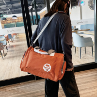 旅行包韩版短途潮耐用牛津布新品男女通用斜挎包手提大容量旅行袋 橘色 中