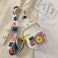 米朵子时尚百搭帆布卡通单肩包斜挎包_托马斯