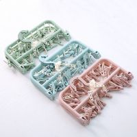 新品防风可折叠家用儿童宝宝衣架塑料多夹袜子内衣挂钩架室外阳台 32夹子衣架 北欧蓝