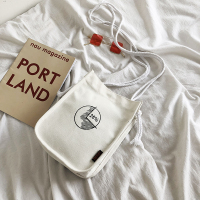 2019新款休闲百搭帆布斜挎包女绑带ins学生单肩帆布袋小包手机包 白色