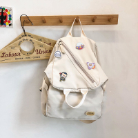 双肩包女2021新款潮时尚单肩斜挎包森系帆布背包韩版高中学生书包 白色+徽章