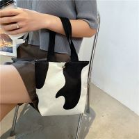 2021春夏韩国百搭豹纹斑马学生外出帆布包托特包手机布袋手提包女 奶牛纹