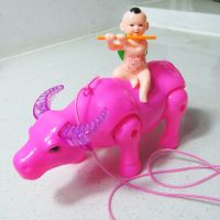 [牛年吉祥物]新款电动牵绳牛发光带音乐牧童骑牛儿童益智仿真牛 牵绳牛粉色1个[没有电池]