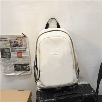 日系学院风书包女大学生校园森系时尚潮流背包男双肩包2021年新款 白色[带荷包蛋徽章]