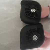 行李箱轮密码箱轮子手拉箱万向轮通用旅行箱静音万向轮配件通用 黑色 Q02一左一右