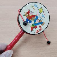 新生婴儿宝宝抓握训练玩具0-1岁乐器拨浪鼓可啃咬男孩女孩小摇铃 单个拨浪鼓