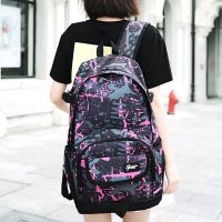 2021新款双肩包女韩版防水休闲旅行背包大容量初中生男中学生书包 迷彩粉1089