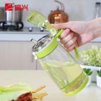 振兴不锈钢玻璃油壶厨房用品防漏防尘550ml(三种颜色随机发货) 振兴不锈钢玻璃油壶厨房用品防漏防尘550ml(三种颜色