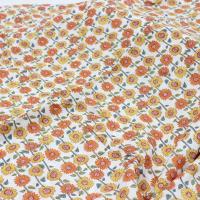 夏印花纯棉布料暗格泡泡棉连衣裙女装衬衫童装防蚊裤棉麻服装面料 白底小太阳花一米价格