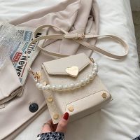 今年流行包包女夏2021新款潮时尚珍珠手提小方包高级感洋气斜挎包 米色
