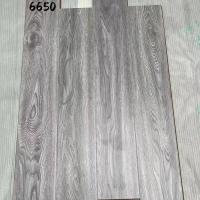工装地板10mm出租房店铺门面工程家用灰色强化复合木地板临沂厂家 6650不 地膜
