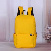 小米炫彩小背包防水轻便时尚双肩包男女情侣旅行背包幼儿园小书包 黄色 10升