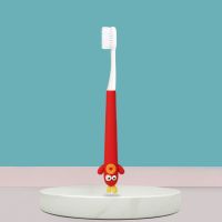 红色小怪兽 儿童牙刷新款萌趣3-6-12岁学生可爱卡通硅胶小怪兽软毛护齿牙刷