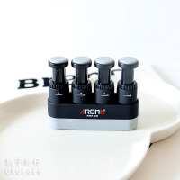 黑色 桃子鱼仔 力量练习器尤克里里吉他 成人儿童指力握力训练器