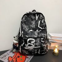 书包男大学生ins潮牌校园背包双肩包女韩版涂鸦中学生书包旅行包 黑色普通款 包+小牛挂件[收藏店铺送礼品]