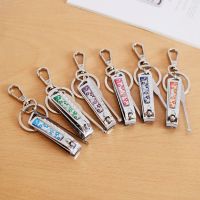 恋舜 便携式三合一功能钥匙扣个性不锈钢指甲剪耳勺钥匙链三件套 Y018 滴油花卉三件套 随机