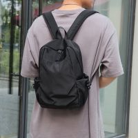 双肩包男士水杯包大容量电脑防水包学生男女尼龙帆布书包商务包包 黑色小号双肩包(边上可放水杯)
