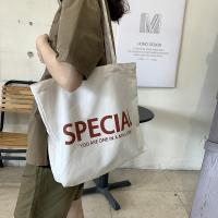 2022原创字母新款单肩包学生书包购物袋ins文艺简约大容量帆布包 款式1