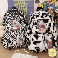 ins日系原宿奶牛纹少女书包女韩版chic大容量背包高中学生双肩包 奶牛纹书包(无挂件无徽章) 收藏店铺 送礼物 优先发