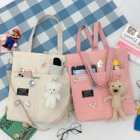 ins帆布包女学生韩版2021新款大容量双肩手提书袋百搭斜挎单肩包 白色 腮红熊挂件(无包)
