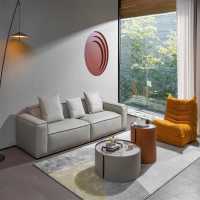 豆腐块造型沙发,放在客厅里,奶呼呼的质感彰显温馨浪漫,又 干净又清爽