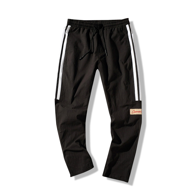 2018春夏年轻男装港风条纹拼接休闲裤 国潮嘻哈百搭小脚哈伦裤男