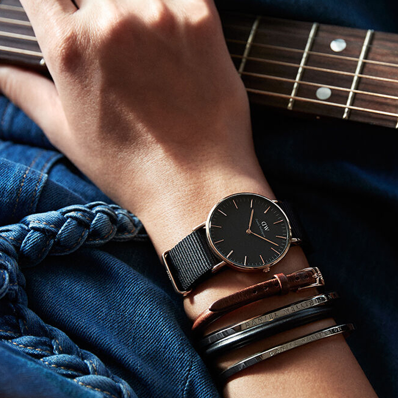 丹尼尔惠灵顿dw女表36mm黑表盘金色边尼龙带超薄女士石英手表dw