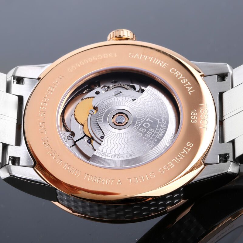 天梭tissot手表豪致系列机械男表银色