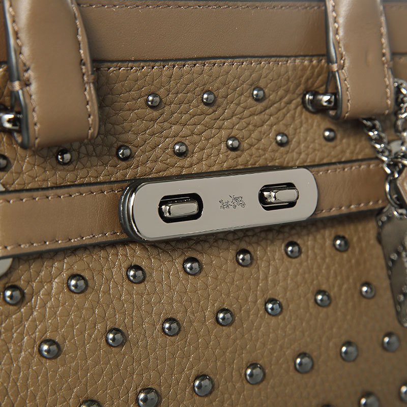 Coach蔻驰 SWAGGER双旋锁铆钉装饰女士手提斜挎包 57696DKLIQF