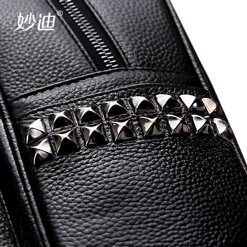 妙迪2019潮款韩版潮百搭铆钉背包头层牛皮双肩包