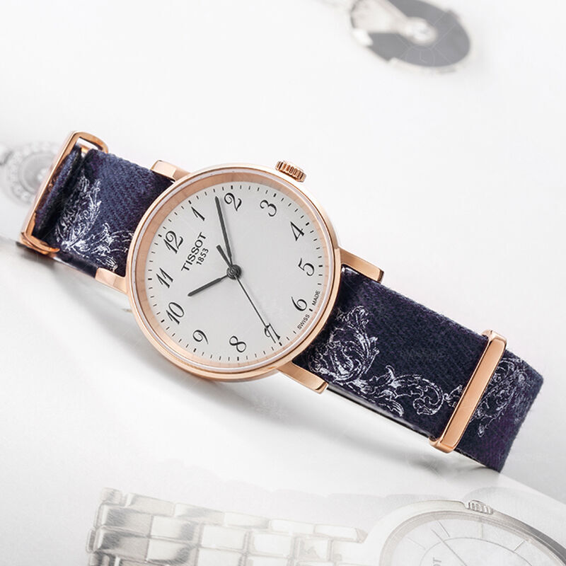 Tissot 天梭魅时系列尼龙带石英女表 T109.210.38.032.00