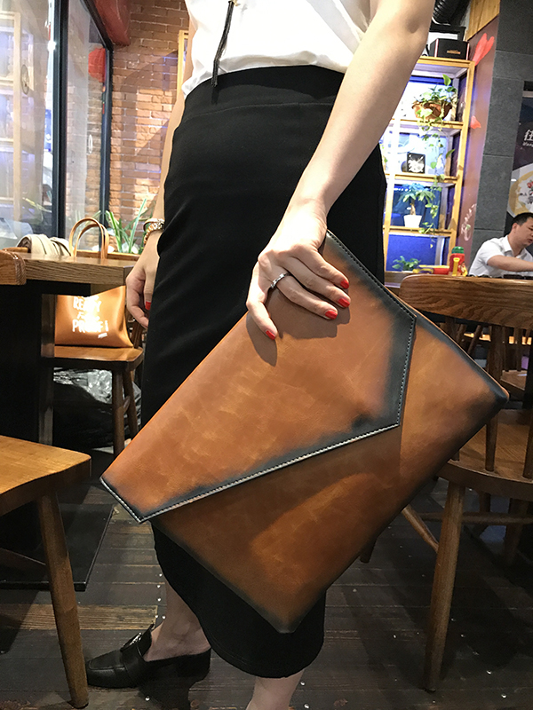 原创个性手拿包时尚气质手抓大包简约新款潮女手包a4文件信封夹包