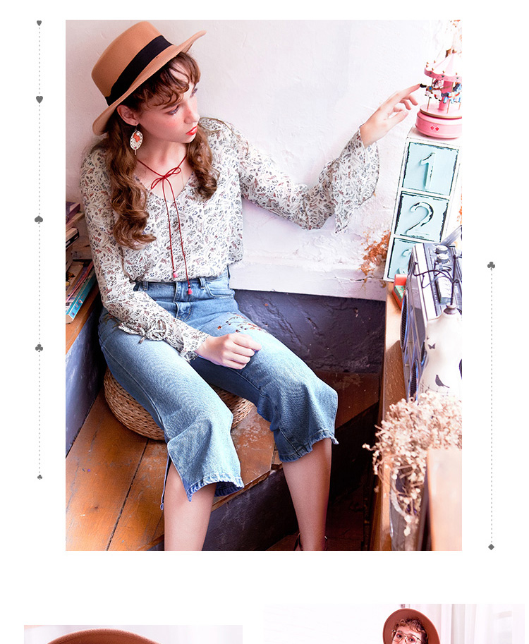 日韩时尚迷人小碎花皮绳流苏装饰v领喇叭长袖小衫