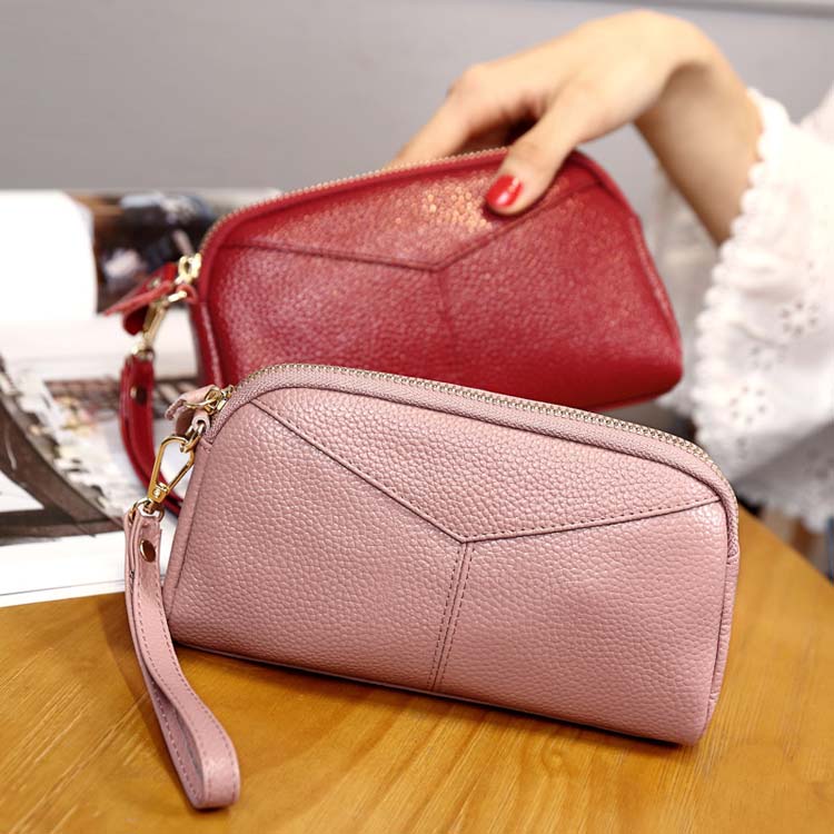 女士手拿包女2017新款休闲时尚潮流简约百搭手包迷你夏天小包包女