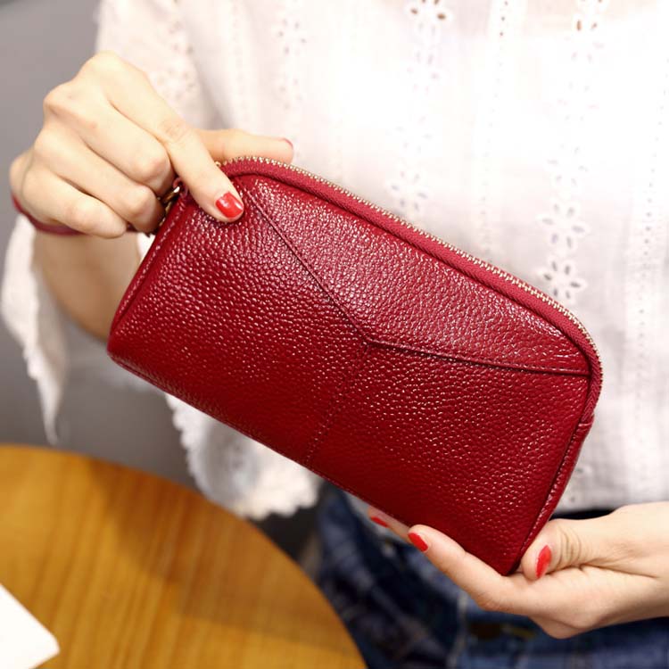 女士手拿包女2017新款休闲时尚潮流简约百搭手包迷你夏天小包包女